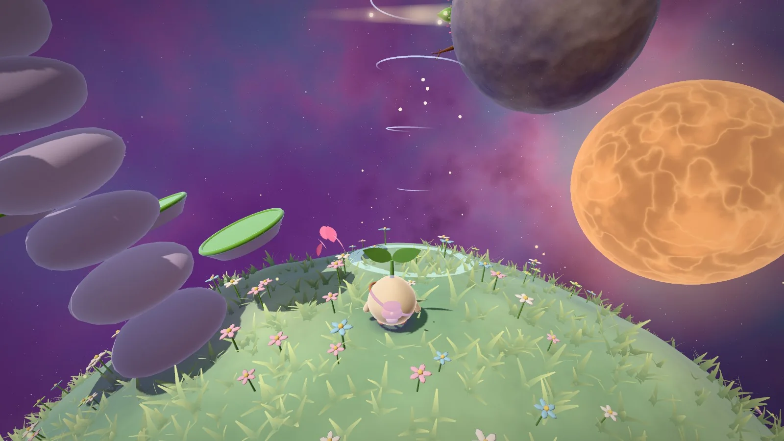 The seedling on a grassy, flower-covered planet beside a spire of stepping stones, with a glowing orange sun behind